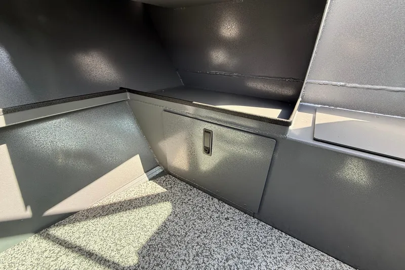 Slide: The Image of Interior view of 2025 Alumaweld Stryker X202 boat, featuring sleek storage compartment. - 32