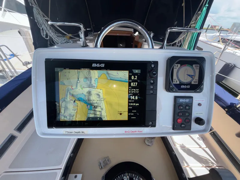 Slide: The Image of Navigation system on a 1995 Island Packet 37 sailboat, displaying nautical charts. - 19