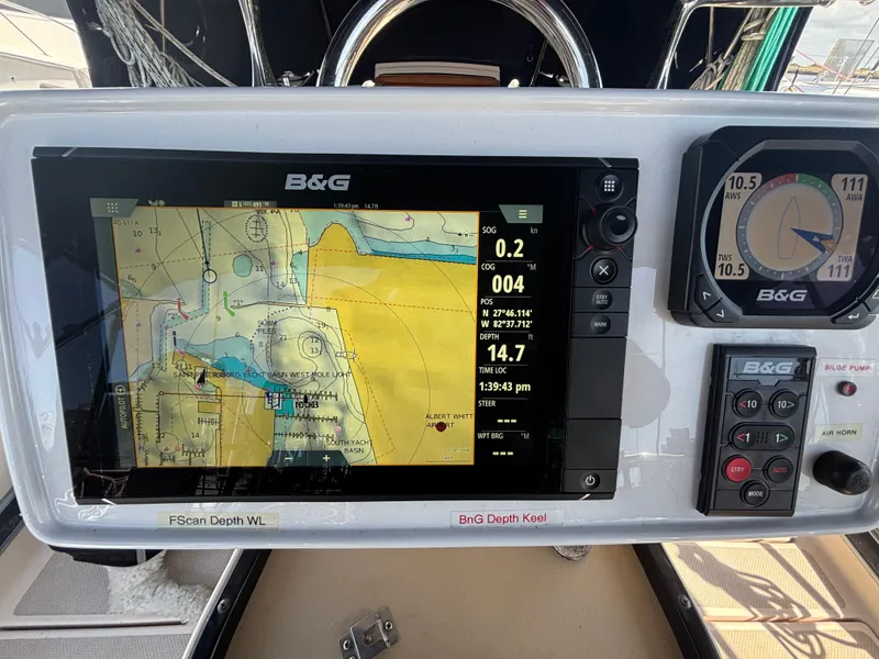 Slide: The Image of B&G navigation system on 1995 Island Packet 37 sailboat, displaying nautical charts and data. - 21