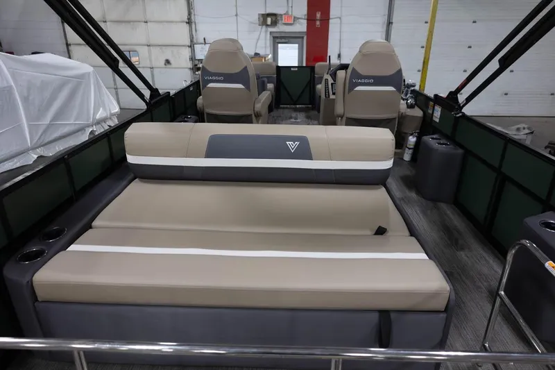 Slide: The Image of Manufacturer Provided Image: 2024 Viaggio Lago X-S boat interior with beige seating and modern design. - 14