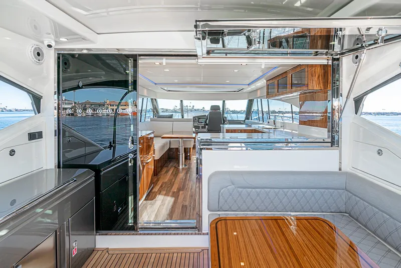 Slide: The Image of 2024 Riviera 5400 Sport Yacht interior with modern design and luxurious finishes. - 28