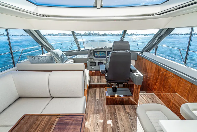 Slide: The Image of Interior of 2024 Riviera 5400 Sport Yacht with ocean view. - 40