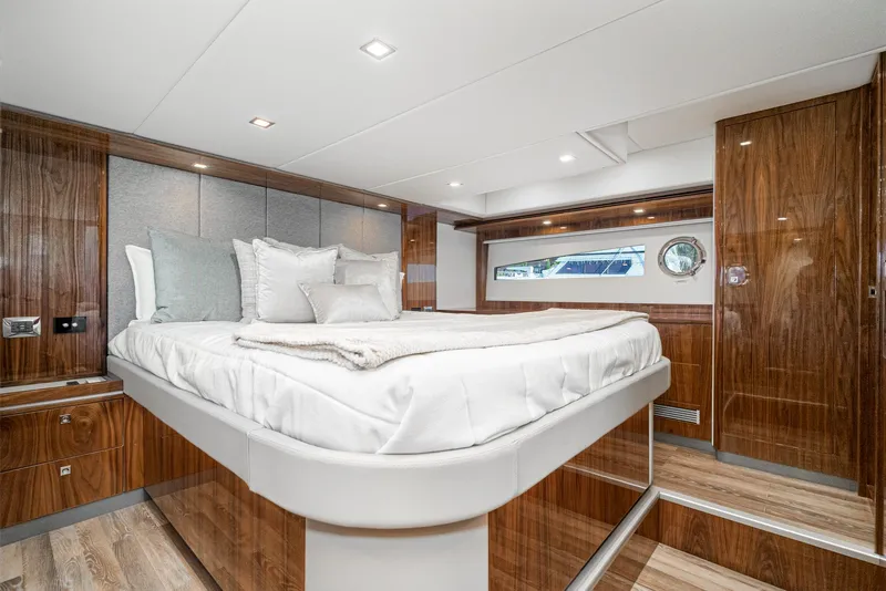 Slide: The Image of Luxurious bedroom interior of 2024 Riviera 5400 Sport Yacht with modern design. - 49