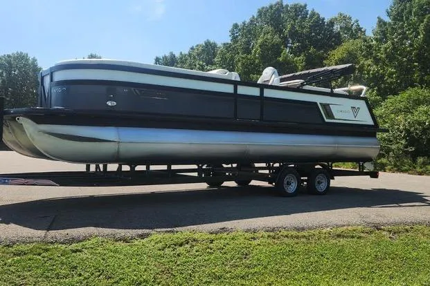 Slide: The Image of 2023 Viaggio Diamante U pontoon boat on trailer, parked outdoors. - 5