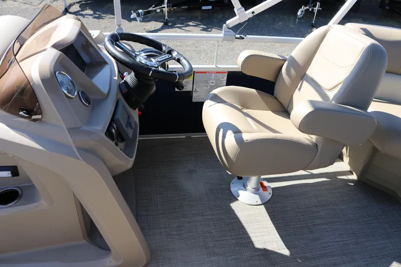 Slide: The Image of Captain's seat and helm of 2025 Sun Chaser Vista Fish 18 boat. - 10