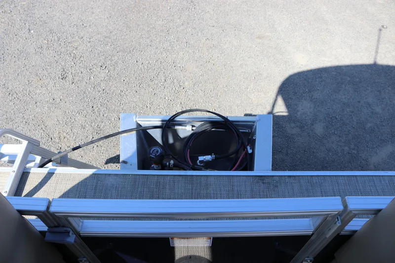 Slide: The Image of 2025 Sun Chaser Vista Fish 18 pontoon boat deck with storage compartment. - 8