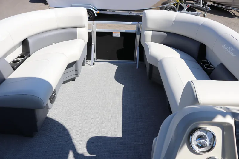 Slide: The Image of Interior of 2025 SunChaser Vista 20 Fish pontoon boat with plush seating and cup holders. - 16