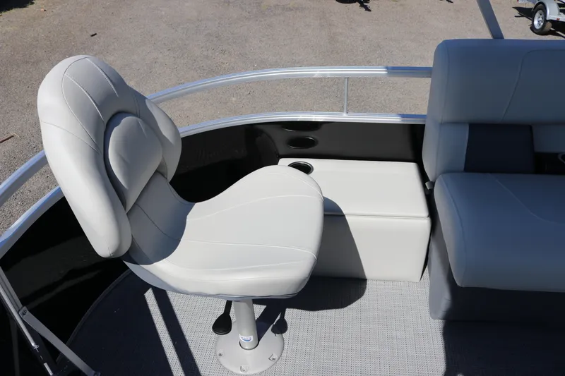 Slide: The Image of 2025 SunChaser Vista 20 Fish boat interior with seating and cup holders. - 8