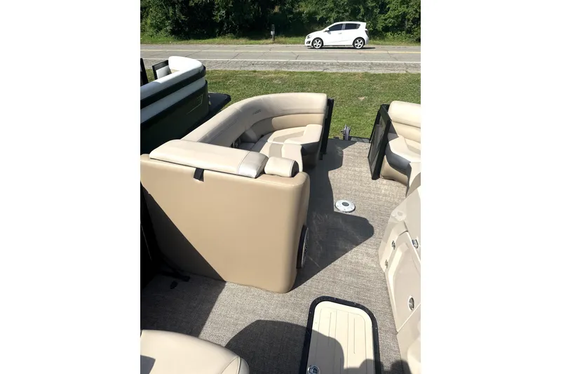 Slide: The Image of 2023 Viaggio Diamante S boat interior with beige seating and carpeted floor. - 7