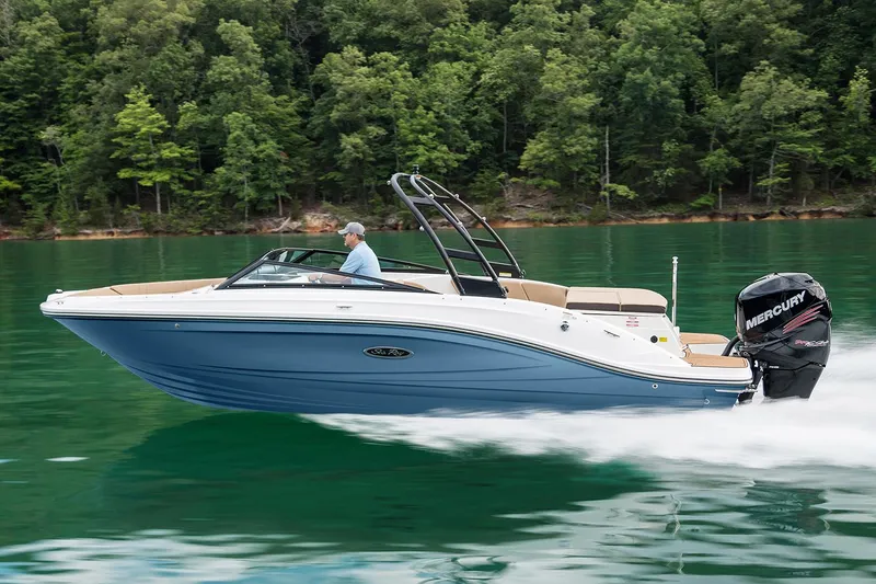 Slide: The Image of Manufacturer Provided Image: 2023 Sea Ray SPX 230 OB cruising on a lake with lush green forest background. - 4