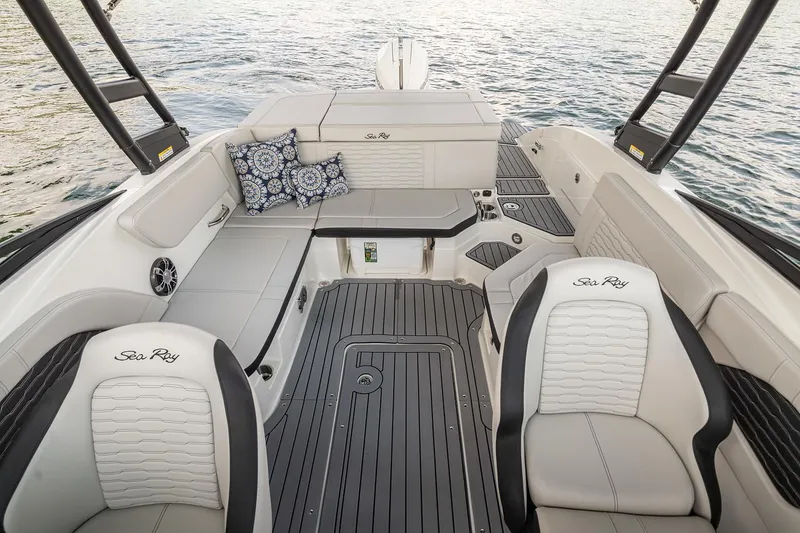 Slide: The Image of Manufacturer Provided Image: 2023 Sea Ray SPX 230 OB boat interior with luxurious seating and modern design. - 9