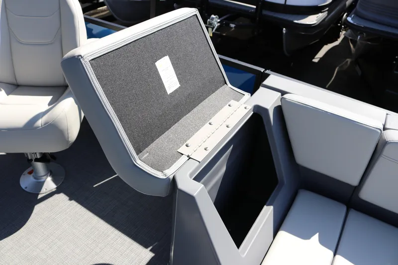 Slide: The Image of SunChaser Lucerne 20 LR DH 2025 boat seat with open storage compartment. - 22