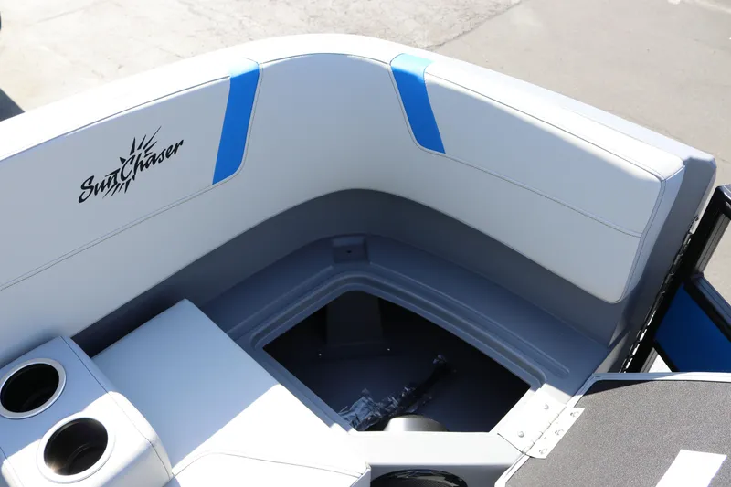 Slide: The Image of Interior seating of 2025 SunChaser Lucerne 20 LR DH boat with cup holders. - 24