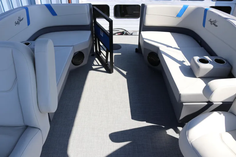 Slide: The Image of 2025 SunChaser Lucerne 20 LR DH pontoon boat interior with gray seating and cup holders. - 32