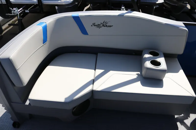 Slide: The Image of 2025 SunChaser Lucerne 20 LR DH boat seating with cup holders, featuring sleek design. - 9