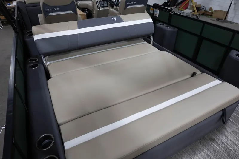 Slide: The Image of Manufacturer Provided Image: 2024 Viaggio Lago X-S boat with luxurious seating and cup holders. - 12