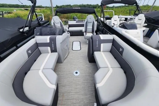 Slide: The Image of 2024 Viaggio Lago X22S pontoon boat with spacious seating and modern design. - 3