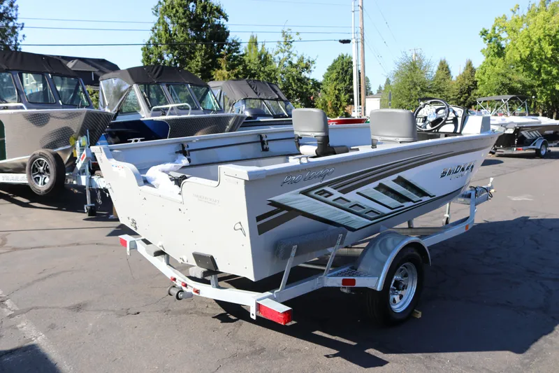 Slide: The Image of 2025 Smoker Craft Pro Lodge 160 boat on trailer in outdoor showroom. - 3