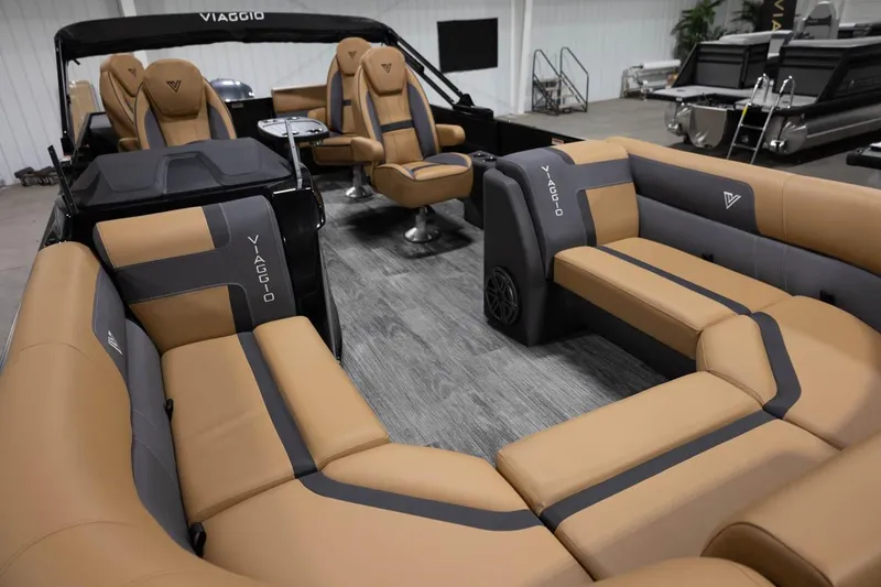 Slide: The Image of Manufacturer Provided Image: 2024 Viaggio Lago X-Q boat interior with luxurious tan and gray seating. - 13