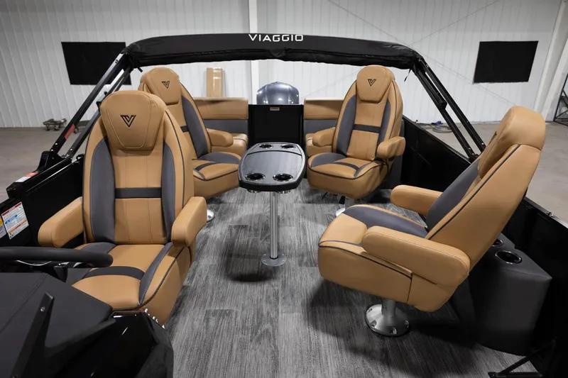Slide: The Image of Manufacturer Provided Image: 2024 Viaggio Lago X-Q boat interior with luxurious tan and gray seating. - 14