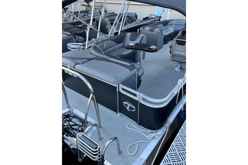 Slide: The Image of 2023 Tahoe Pontoon LTZ Cruise with sleek seating and modern design. - 4