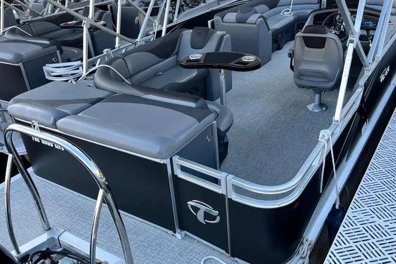 Slide: The Image of 2023 Tahoe Pontoon LTZ Cruise boat interior with luxurious seating and modern design. - 7