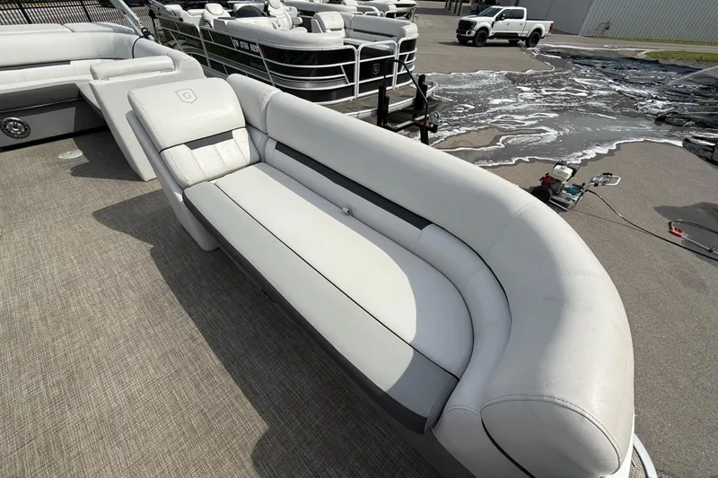 Slide: The Image of Luxurious seating on 2023 Godfrey Sweetwater 2286 C pontoon boat, showcasing modern design. - 12
