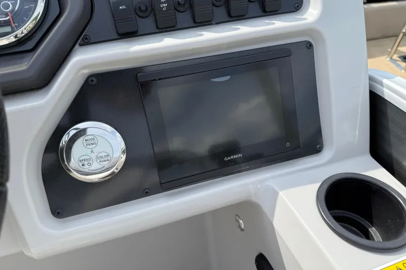 Slide: The Image of Dashboard of 2023 Godfrey Sweetwater 2286 C with Garmin display and control panel. - 7