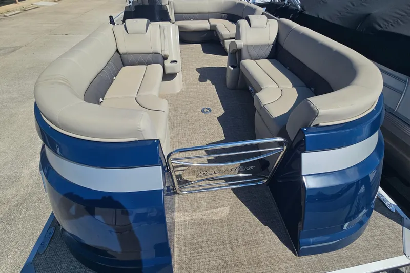 Slide: The Image of 2024 Silver Wave 2410 SW3 RLP pontoon boat with spacious seating and elegant design. - 13