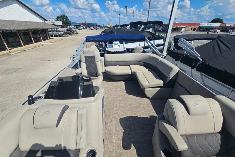 Slide: The Image of 2024 Silver Wave 2410 SW3 RLP pontoon boat with luxurious seating and modern design. - 4