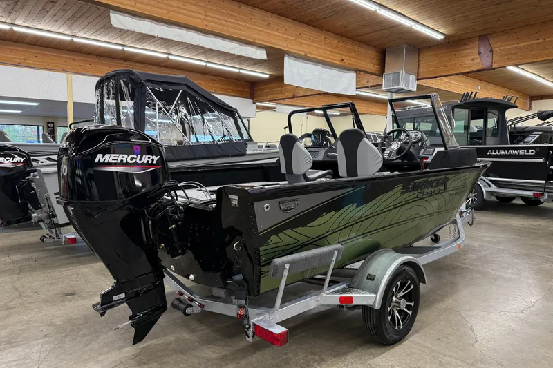 Slide: The Image of 2025 Smoker Craft Excursion 166 SC Pro boat with Mercury engine in showroom. - 5