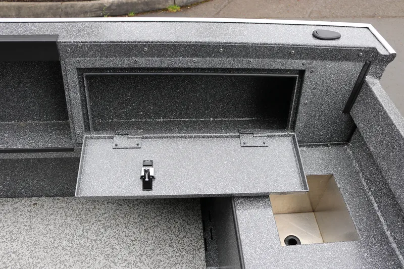Slide: The Image of 2024 Alumaweld Free Drifter 20 boat storage compartment with open hatch and latch. - 4