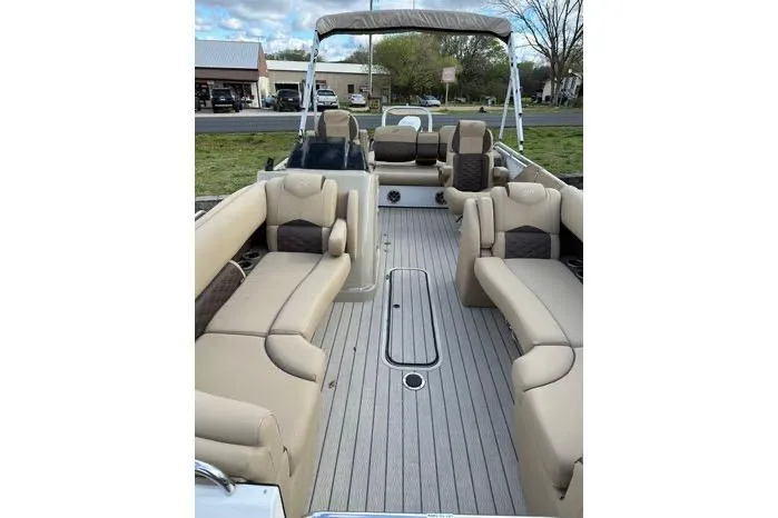 Slide: The Image of 2024 Silver Wave 2610 SW7 JS pontoon boat with spacious seating and modern design. - 12