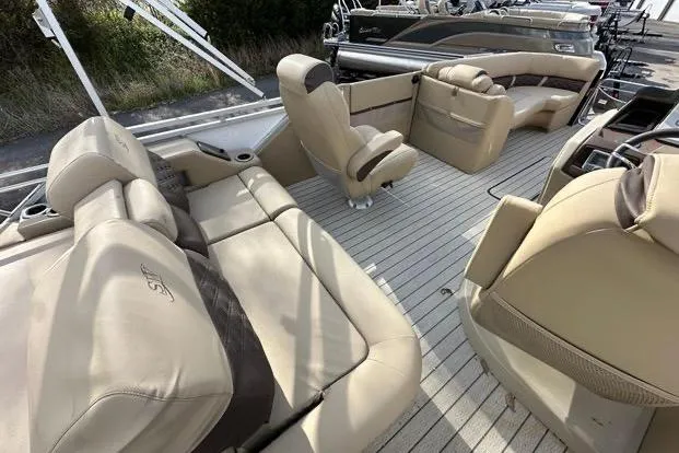 Slide: The Image of Luxurious interior of 2024 Silver Wave 2610 SW7 JS boat with beige seating. - 4