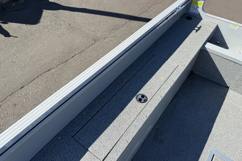 Slide: The Image of 2024 Smoker Craft Freedom 180 TL boat interior with storage compartment. - 17