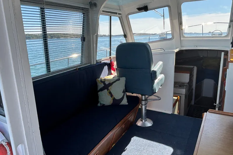Slide: The Image of Interior of 1985 Jarvis Newman 36 boat with seating and ocean view. - 19