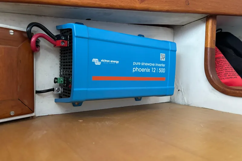 Slide: The Image of Blue Victron Energy inverter installed on a Jarvis Newman 36 boat, model year 1985. - 60