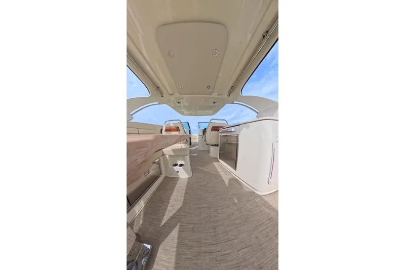 Slide: The Image of 2024 Chris-Craft Launch 35 GT interior with elegant seating and modern amenities. - 21