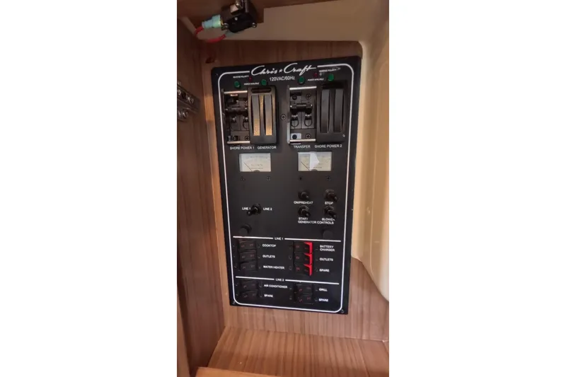 Slide: The Image of Electrical control panel on 2024 Chris-Craft Launch 35 GT boat. - 32