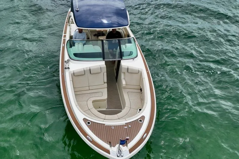 Slide: The Image of 2024 Chris-Craft Launch 35 GT boat on water, aerial view. - 5