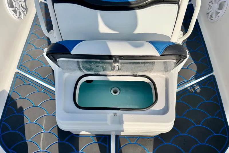 Slide: The Image of 2020 Skeeter SX230 boat interior with open livewell and stylish flooring. - 10