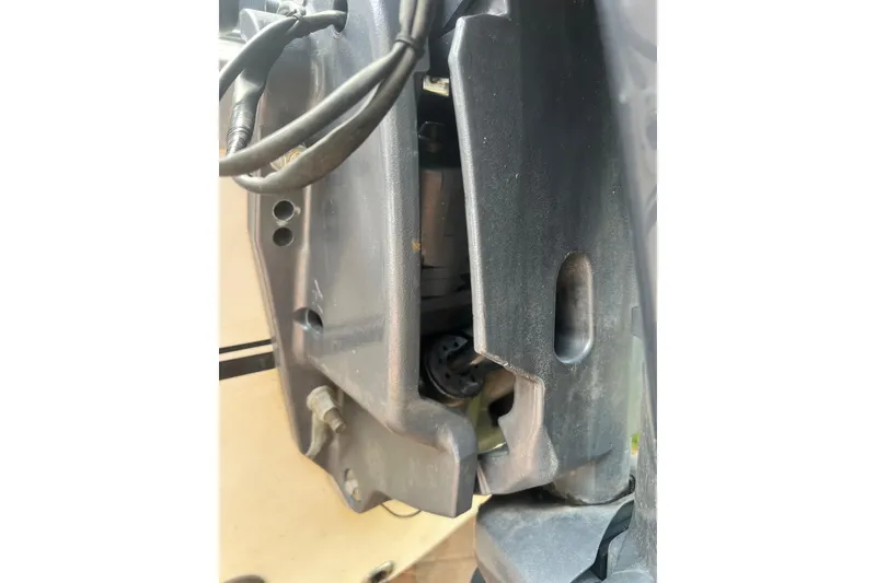 Slide: The Image of Close-up of a 2008 NauticStar 2000 Offshore boat engine component. - 7