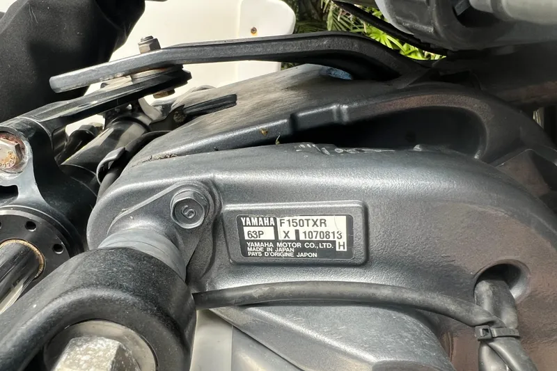 Slide: The Image of Close-up of Yamaha F150TXR engine on 2008 NauticStar 2000 Offshore boat. - 8
