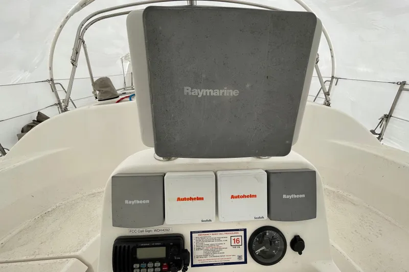 Slide: The Image of Cockpit of 1999 Hunter 380 sailboat with Raymarine navigation equipment. - 12