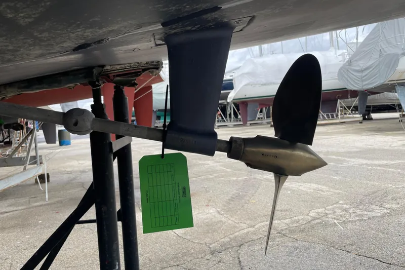 Slide: The Image of Close-up of a 1999 Hunter 380 sailboat propeller and rudder in a boatyard. - 7