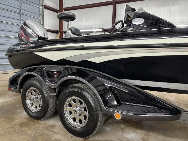 Slide: The Image of 2013 Ranger 520C boat with Evinrude motor in warehouse. - 5