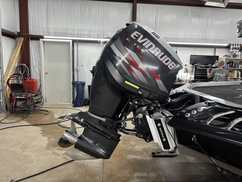 Slide: The Image of 2013 Ranger 520C boat with Evinrude motor in workshop. - 6