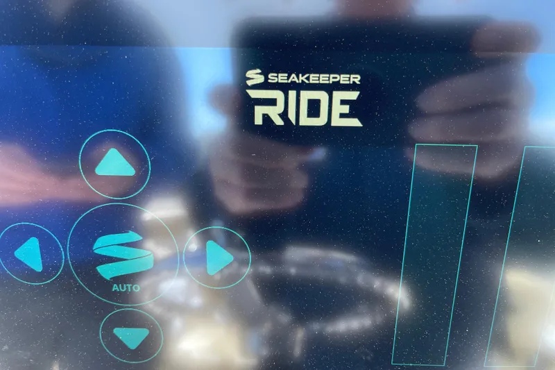 Slide: The Image of Touchscreen interface of 2024 Sportsman Masters 247 Bay Boat with Seakeeper Ride controls. - 21