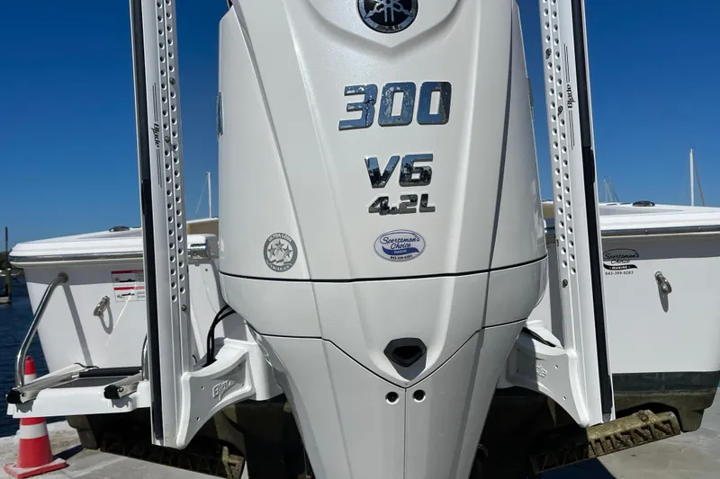 Slide: The Image of 2024 Sportsman Masters 247 Bay Boat with 300 V6 4.2L engine at dock. - 34
