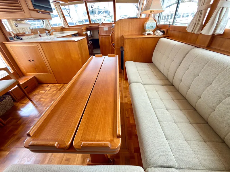 Slide: The Image of Interior of a 2003 Grand Banks Classic yacht with wooden furnishings. - 20